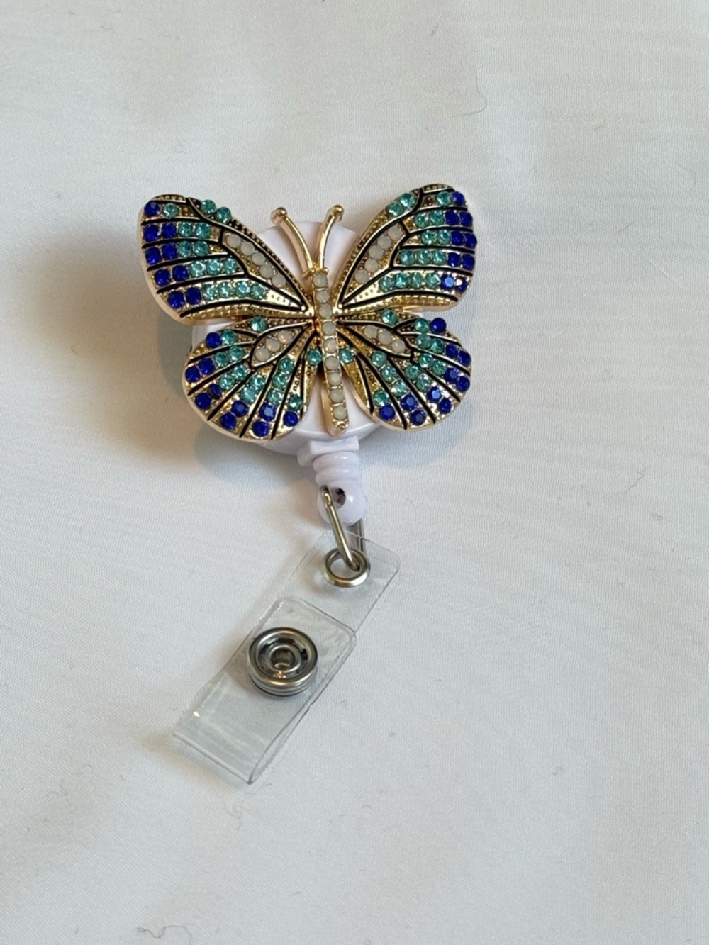 Butterfly Crystal Badge Reel in Blue and Teal, NWOT
